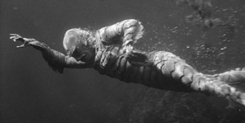 The Creature swims in the lagoon