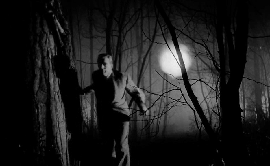 Dan Andrews is chased through the woods