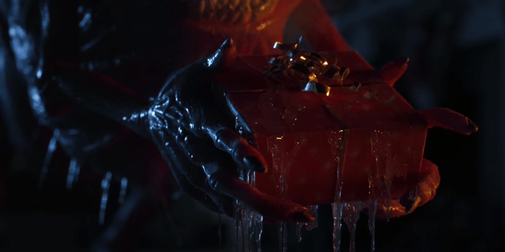 The creature holds a gift