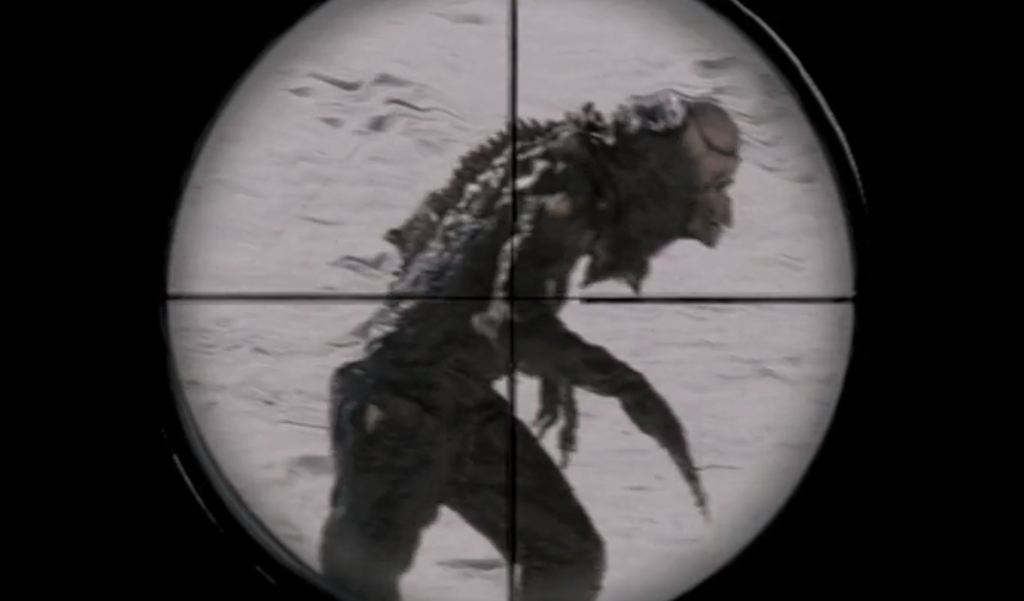 The creature seen through a rifle scope