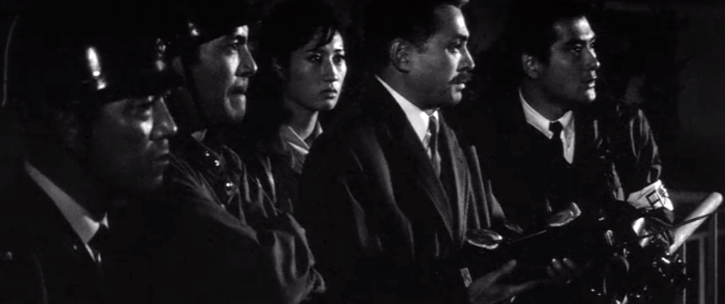 onlookers watch Gamera