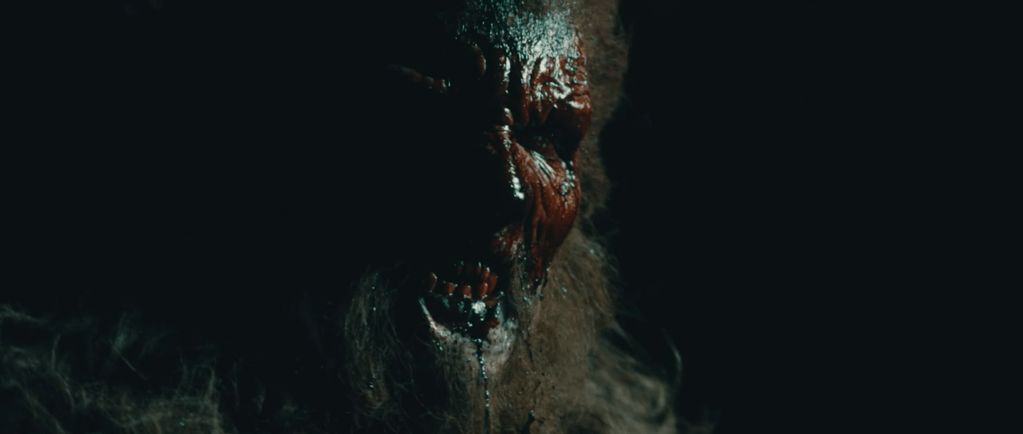 Bigfoot gets covered in the blood of the creatures he's killing