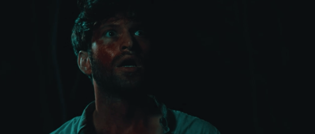 The protagonist watches the creatures fight