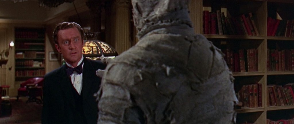 You'd have the same expression if a big-boned mummy was looming over you!