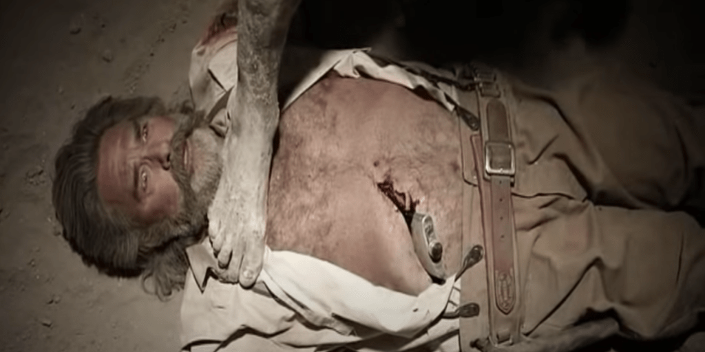 ...and then a savage rams a red-hot metal hip flask into his wound. Ouch!