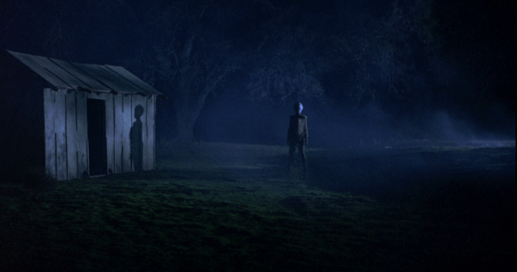 The alien trophy hunter lurks by a shack