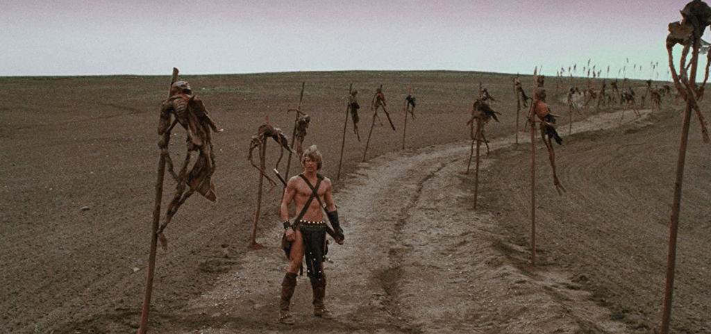 A road lined with withered corpses