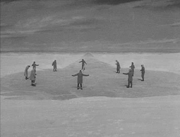 The iconic moment the crew mark out the shape of the spacecraft buried beneath the ice