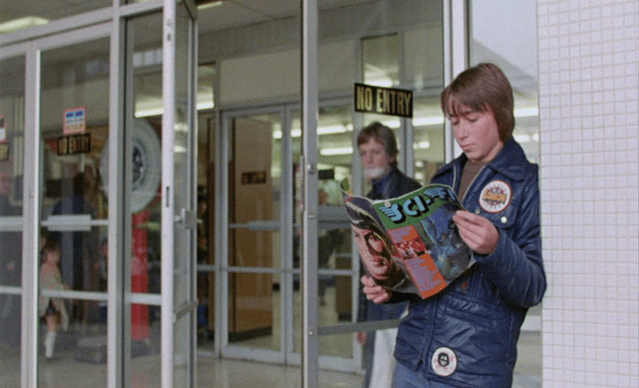 Pete reads a copy of poster magazine SCI-FI MONTHLY