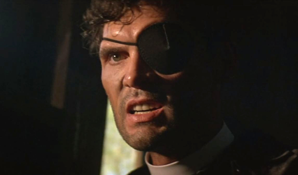 Everett McGill as the Reverend