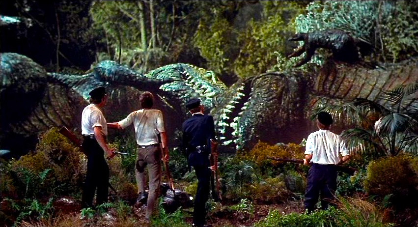 Doug McClure views the dead Allosaurs