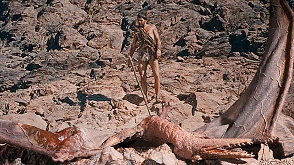 Robin Hawdon, as Tara, stands over the dead Rhamphorhynchus