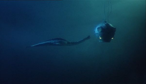 A weird serpentine creature attacks Doug McClure's diving bell in WARLORDS OF ATLANTIS