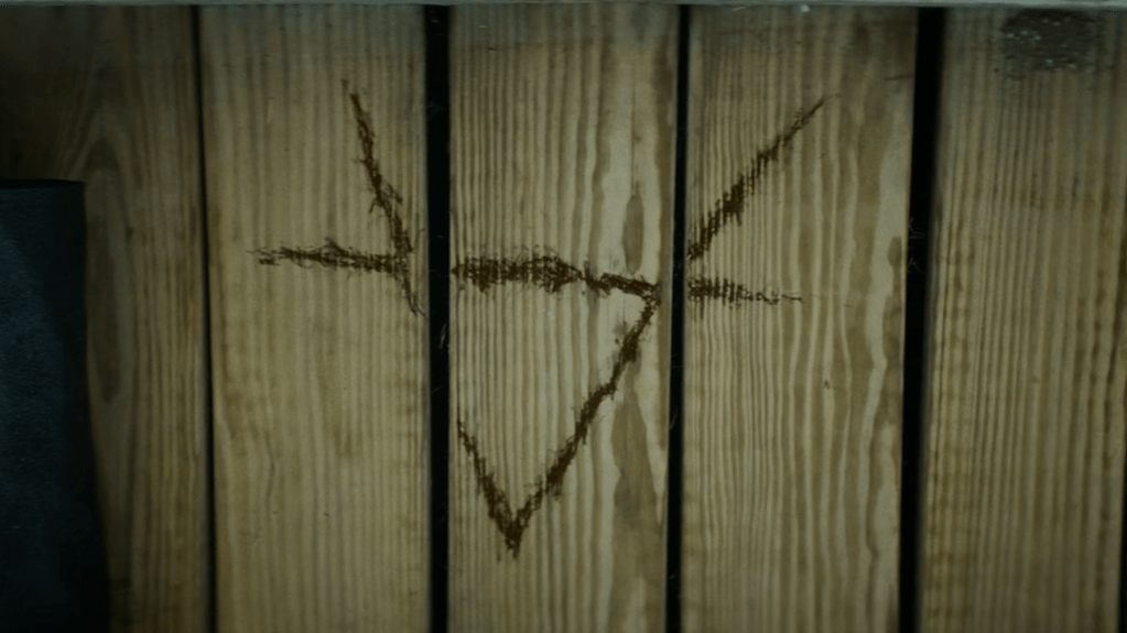 ...and here's the symbol again outside the neighbour's front door