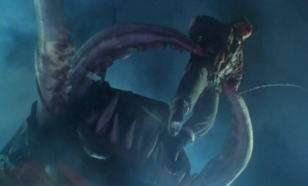 The critter prepares to swallow Jacky Cheung!