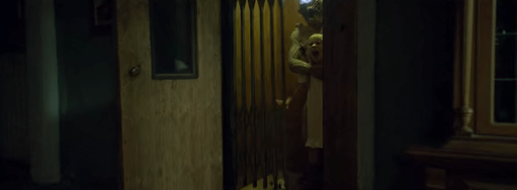 One of the beings abducts Emily