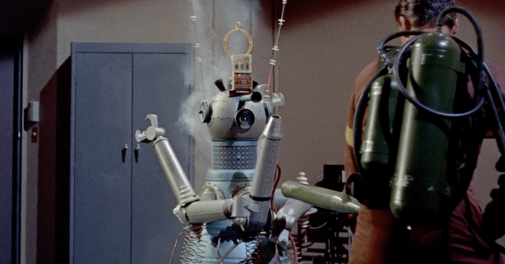 Magog starts to smoke after David attacks it with a flame thrower