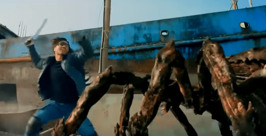 Rescue team captain One Eye attacks a spider with a machete!