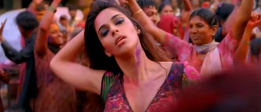 She starts dancing when she hears a snake charmer playing his flute