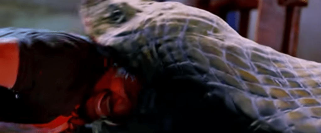 A guy gets swallowed by Nagin in her giant snake form