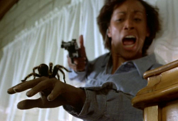 Trying to remove a tarantula from your hand with a gun is not a good idea...