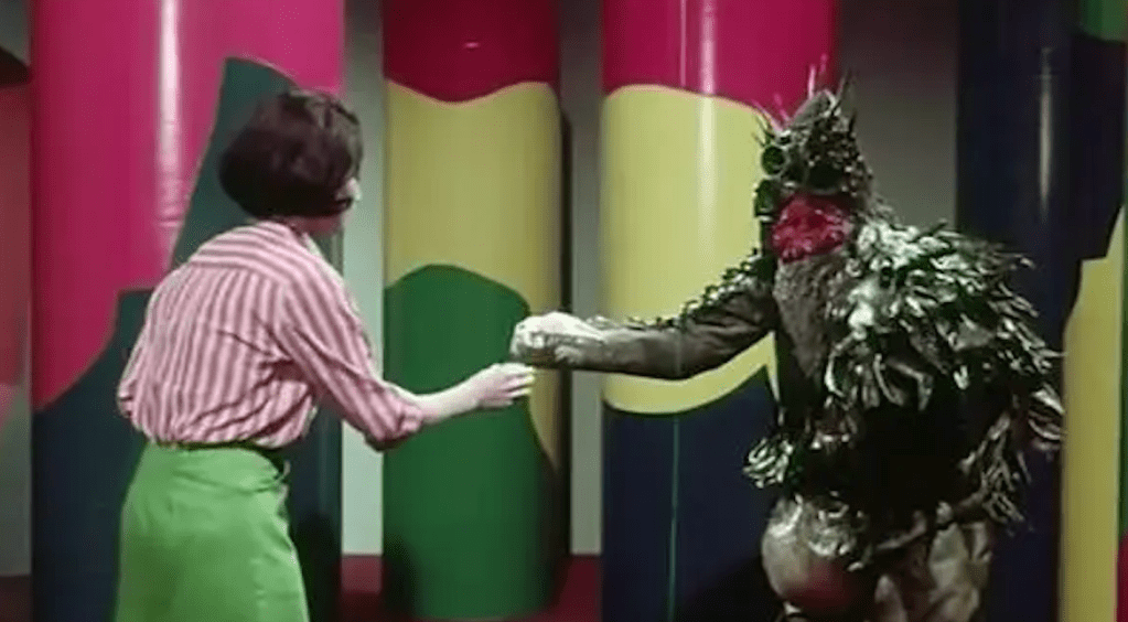 Sandy (Zena Marshall) and the alien