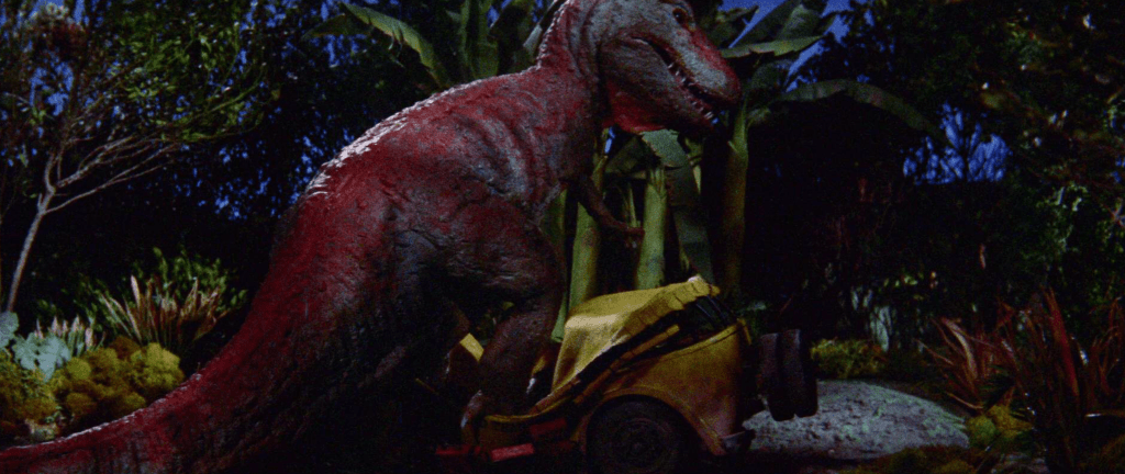 The Tyrannosaurus crushes a vehicle full of islanders: pretty ruthless for a children's film!