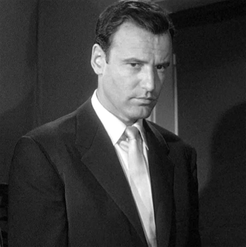 Richard Anderson is unfortunately less animated than the calcified Faceless Man