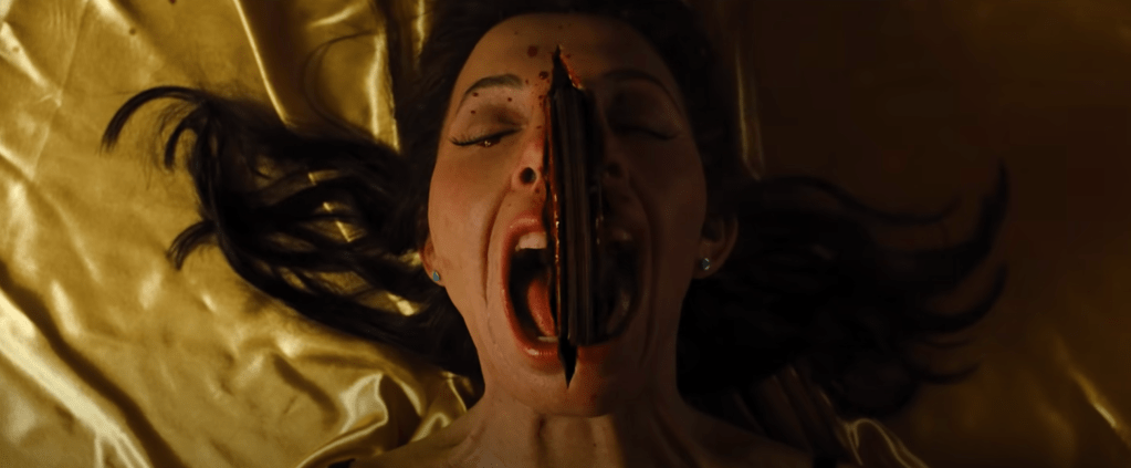 The chainsaw rips through Whitney Cummings' head...