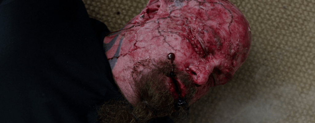 Krug (Kerry King) gets fried in an electrical accident