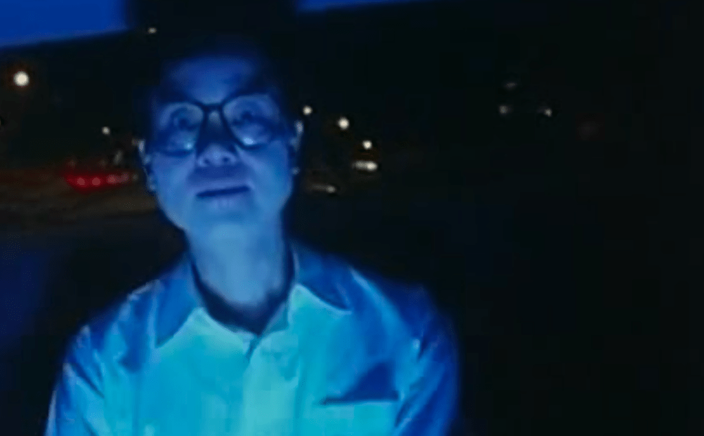 The ghost of a murder victim appears in the back of the solicitor's car