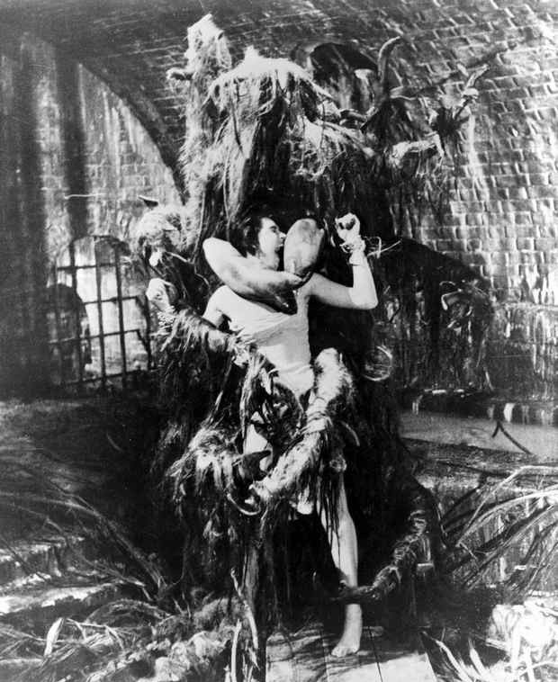 One of the many voyeuristic shots of women being groped by the vegetable-beast's branch-arms