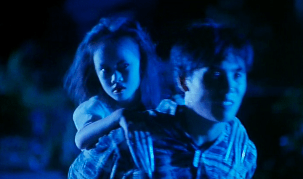 The girl-spectre rides on the back of the would-be arsonist!