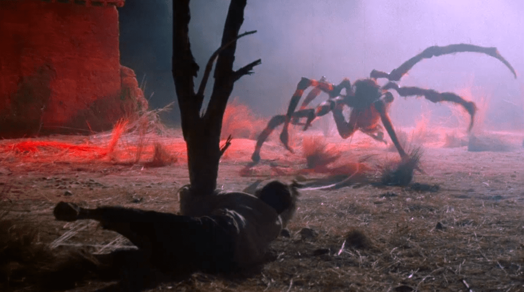 Joker escapes from the spiderweb, but the multi-legged demon continues to pursue him