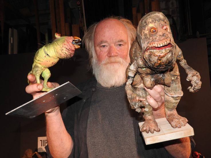 Here's a pic of Phil Tippet posing with two of his stop-motion puppets...