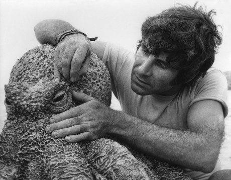 Behind the scenes shot of Roger Dicken with one of the octopus models