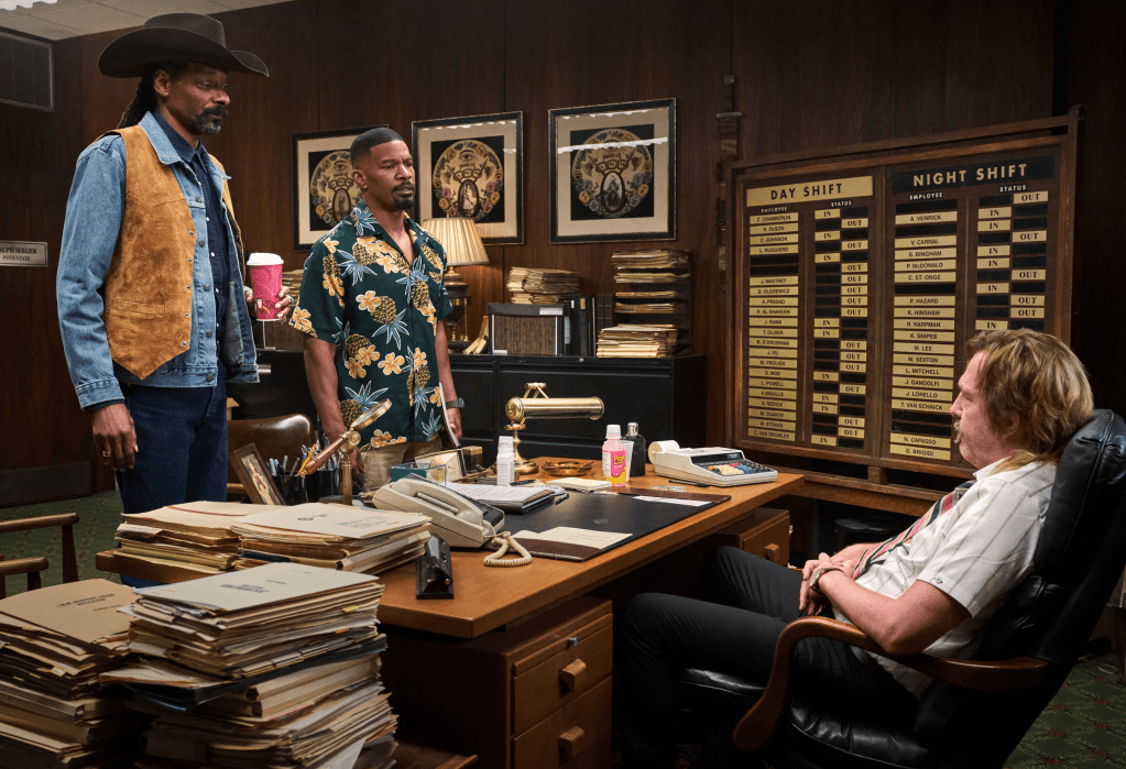 Snoop Dogg is pretty tall, especially when he's wearing a stetson