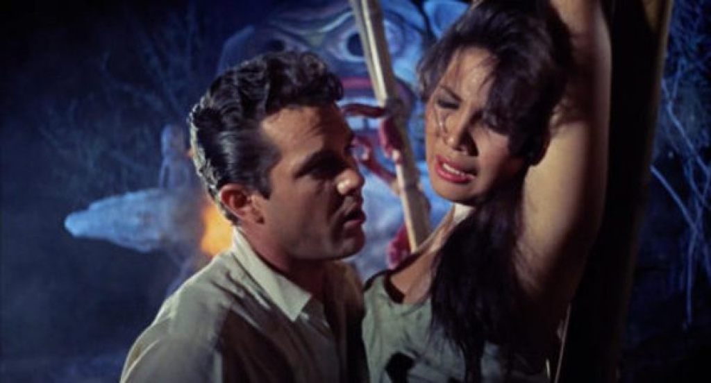 She's tied-up... awaiting the arrival of the blobby, woman-ripping creature!