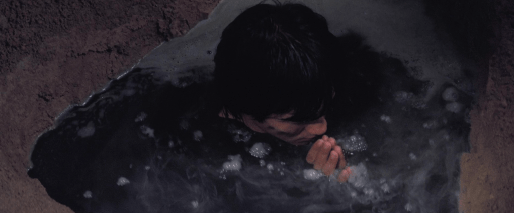 Sheng performs the ritual that will turn him into the Oily Maniac