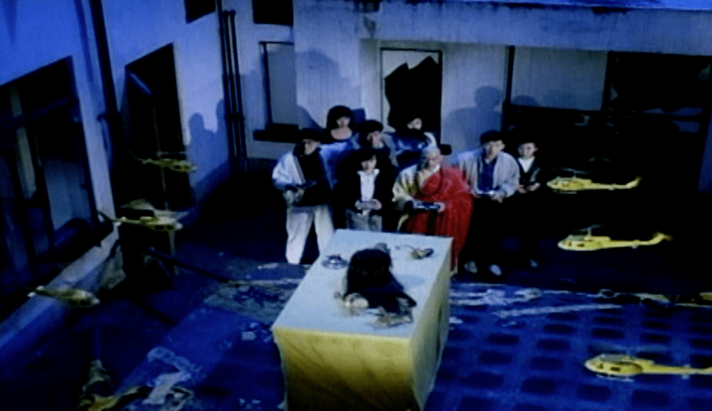 The ghost's head lands onto a table and it is soon surrounded by the 'copters...