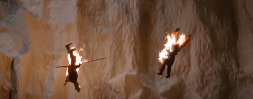 Immolated monks fall to their doom