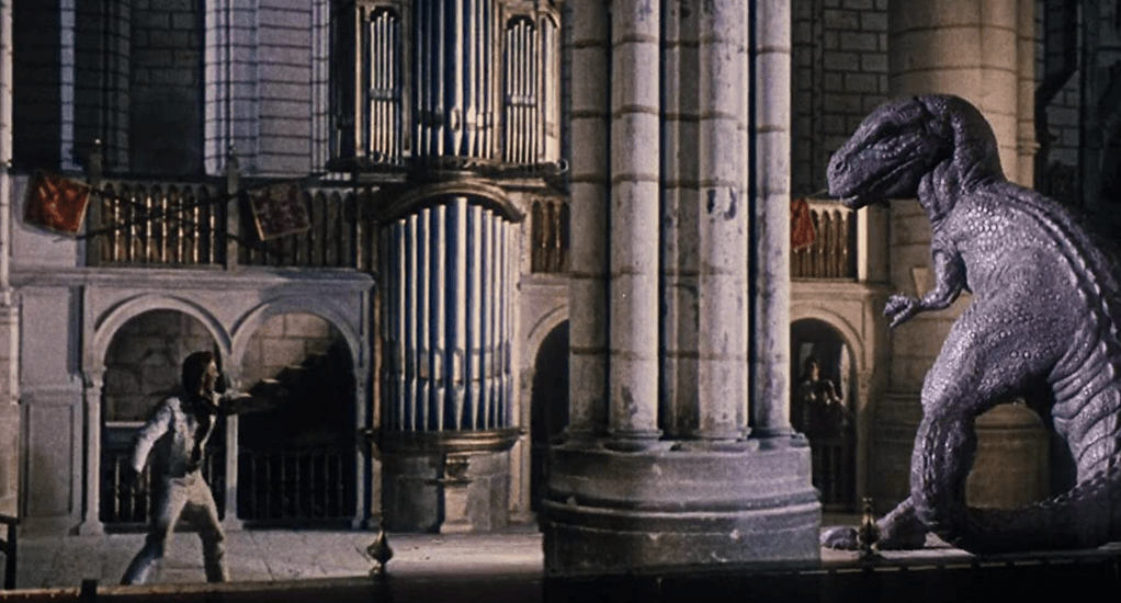 ...and there's a cat-and-mouse encounter inside the building, as Tuck takes on the giant predator...