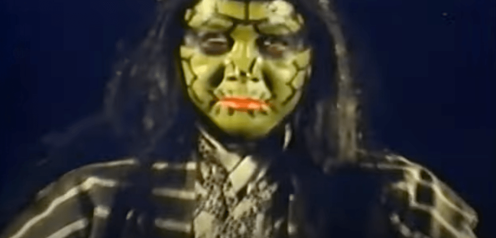 The quality of the snake-human's makeup is, ah, less than Oscar standard