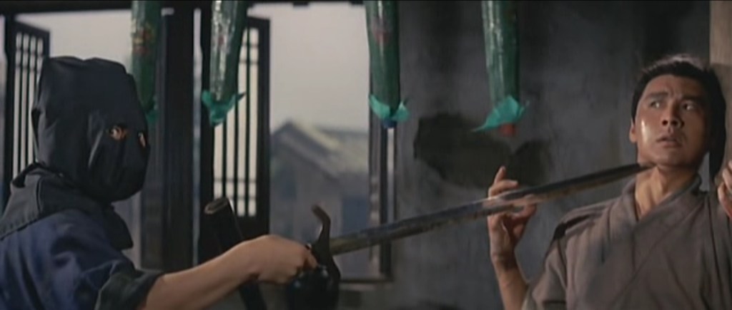 The masked swordsman turns out to be the other dude's brother just messing around