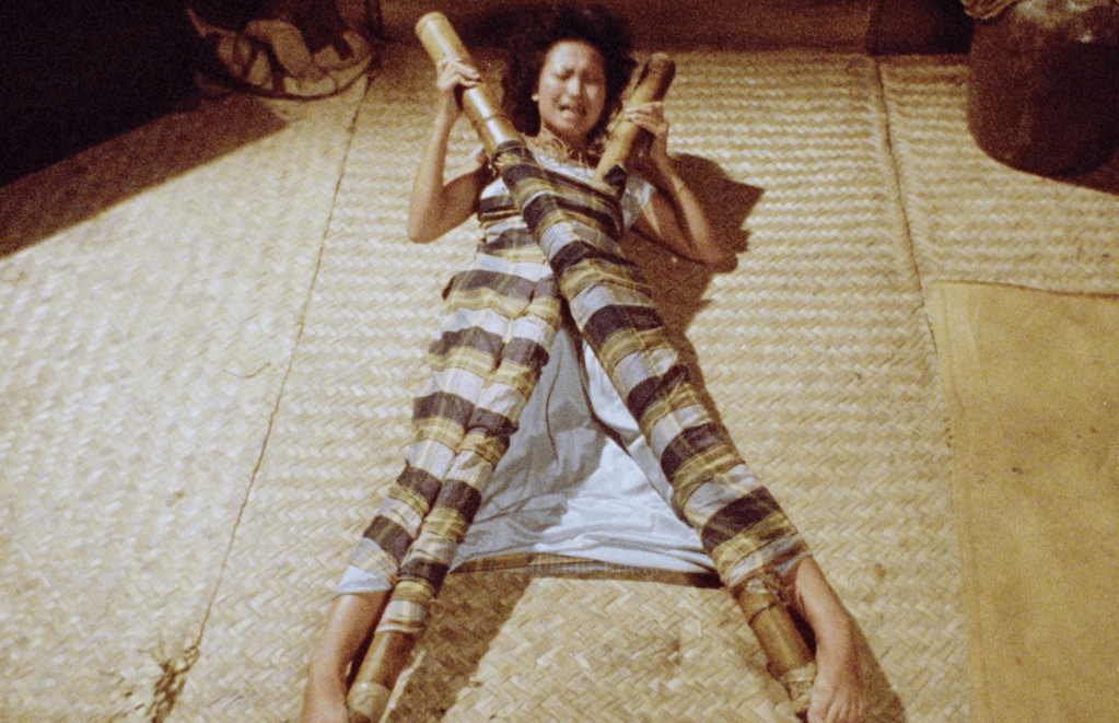 Stella is attacked by parts of her bamboo bed...