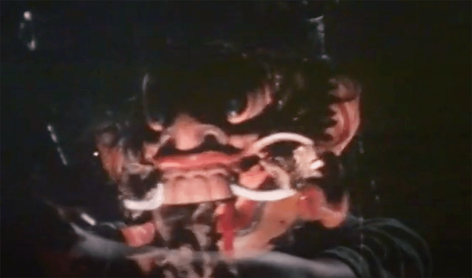 Sometimes the mask of the Red Dwarf ghost is superimposed over the image of its possessed victim