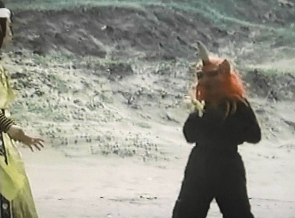 The horned monster-dude is stabbed with the 'Demon Killer Sword'