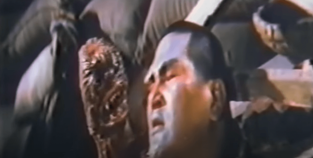 The injured monk is pestered by the weird creature!