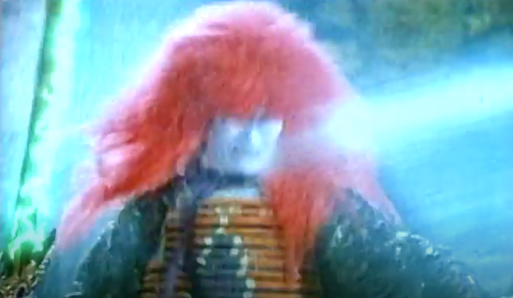 ...which gushes into King Devil's face!