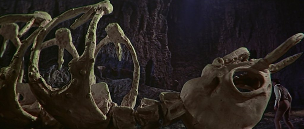 The selenites strip the mooncalf of its flesh, leaving a skeleton